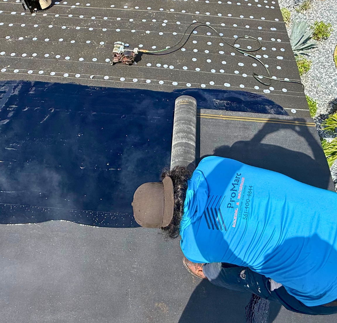 promarc roofing crew above web